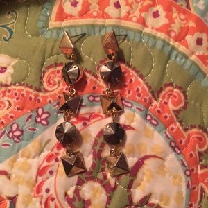 Gold and black dangling earrings